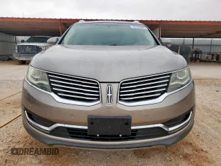 2017 Lincoln MKX Reserve z VIN 2LMPJ6LR6HBL30244, wystawiony jako Copart lot #56879745 z przebiegiem 98 771 mil mil oraz Czysty tytuł • Clean title. Historia ofert i sprzedaży dostępna na DreamBid. Obrazek 5.