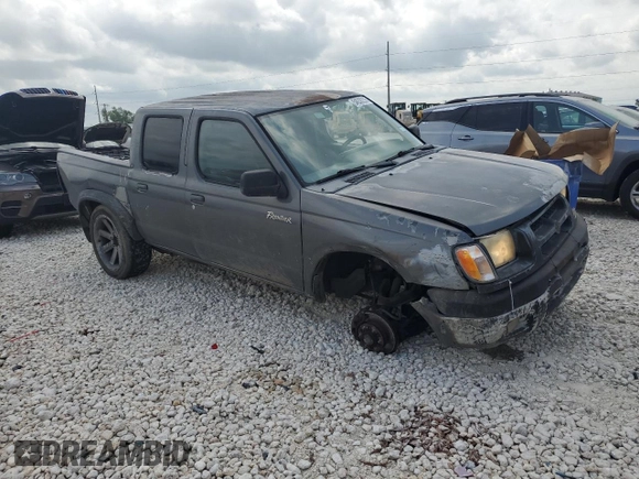 2000 Nissan Frontier XE with VIN 1N6ED27T3YC348002, listed as a Copart auction lot 54538235 with 289,922 mi miles and Salvage title. Bid and sale history available at DreamBid. Image 4.