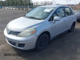 2009 Nissan Versa 1.8 S with VIN 3N1BC11E19L375222, listed as a IAAI auction lot 41736533 with 197,946 mi miles. Bid and sale history available at carsss.com. Image 2.