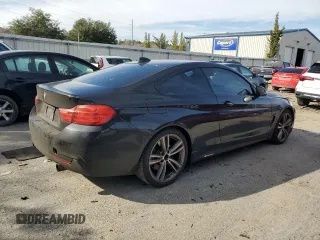 2015 BMW 4 Series 435i with VIN WBA3R1C59FK193517, listed as a Copart auction lot 88938695 with 166,102 mi miles and Salvage Title. Bid and sale history available at DreamBid. Image 3.
