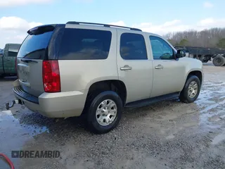 2007 GMC Yukon SLT with VIN 1GKFC13087R279128, listed as a IAAI auction lot 41431757 with 228,125 mi miles. Bid and sale history available at carsss.com. Image 4.