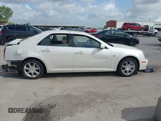 2005 Cadillac STS with VIN 1G6DC67A850172166, listed as a IAAI auction lot 39667014 with 64,676 mi miles and . Bid and sale history available at DreamBid. Image 13.