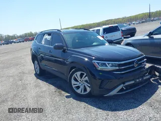 2023 Volkswagen Atlas SE z VIN 1V2KR2CA3PC522546, wystawiony jako IAAI lot #42065884 z przebiegiem 31 076 mil mil oraz . Historia ofert i sprzedaży dostępna na DreamBid. Obrazek 1.