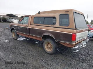 1990 Ford F-150 with VIN 2FTEF14Y1LCA00886, listed as a IAAI auction lot 41774272 with 17,872 mi miles. Bid and sale history available at carsss.com. Image 3.