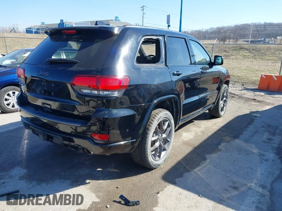 2021 Jeep Grand Cherokee 80th Anniversary with VIN 1C4RJFBG9MC745643, listed as a IAAI auction lot 41729989 with 88,567 mi miles and . Bid and sale history available at DreamBid. Image 4.