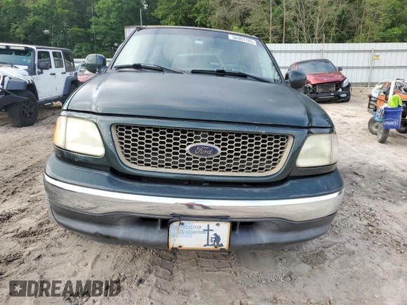 2003 Ford F-150 XL with VIN 1FTRX07WX3KB99581, listed as a Copart auction lot 56907765 with 232,597 mi miles and Salvage title. Bid and sale history available at DreamBid. Image 5.