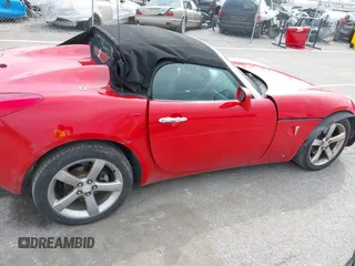 2007 Pontiac Solstice z VIN 1G2MB35B07Y112451, wystawiony jako IAAI lot #41991283 z przebiegiem 163 216 mil mil oraz . Historia ofert i sprzedaży dostępna na DreamBid. Obrazek 13.