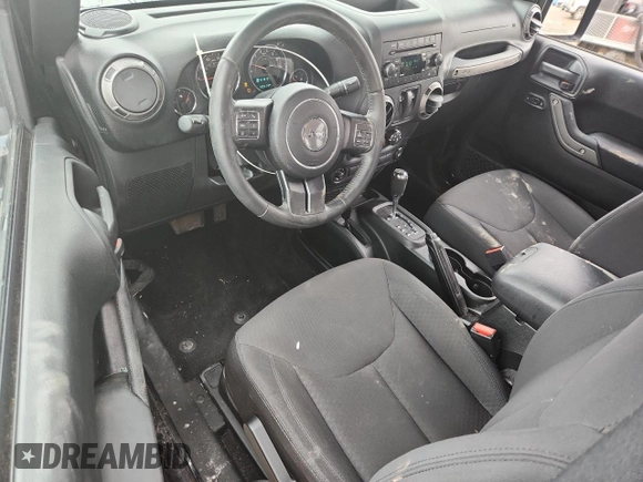2016 Jeep Wrangler Willys Wheeler with VIN 1C4GJWAG6GL326498, listed as a Copart auction lot 62849715 with 49,414 mi miles and Salvage title. Bid and sale history available at DreamBid. Image 8.