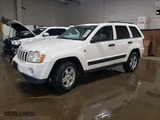 2005 Jeep Grand Cherokee Laredo with VIN 1J4HR48N75C679152, listed as a Copart auction lot 46933765 with 221,299 mi miles and Salvage Title. Bid and sale history available at carsss.com. Image 1.