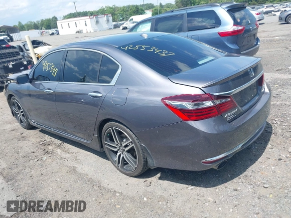 2017 Honda Accord Touring with VIN 1HGCR3F98HA015928, listed as a IAAI auction lot 42553437 with 168,902 mi miles and . Bid and sale history available at DreamBid. Image 3.