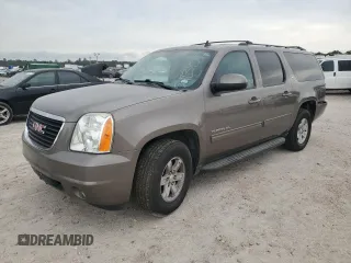 2013 GMC Yukon XL SLT with VIN 1GKS1KE01DR305054, listed as a Copart auction lot 54831015 with 158,054 mi miles and Salvage Title. Bid and sale history available at DreamBid. Image 1.