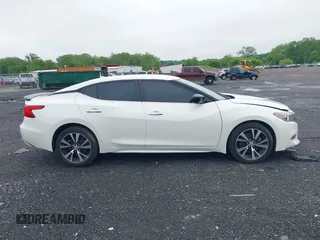 2016 Nissan Maxima SV z VIN 1N4AA6AP2GC375242, wystawiony jako IAAI lot #42220608 z przebiegiem 59 983 mil mil oraz . Historia ofert i sprzedaży dostępna na DreamBid. Obrazek 13.