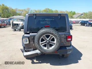 2018 Jeep Wrangler Unlimited Sahara with VIN 1C4HJXEG0JW166645, listed as a IAAI auction lot 42228492 with 58,416 mi miles and . Bid and sale history available at DreamBid. Image 17.