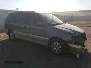 2005 Kia Sedona LX with VIN KNDUP132X56695902, listed as a Copart auction lot 73604104 with 109,676 mi miles and Salvage Title. Bid and sale history available at carsss.com. Image 4.