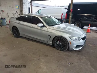 2016 BMW 4 Series 428i xDrive with VIN WBA4C9C56GG139973, listed as a IAAI auction lot 41834506 with 94,587 mi miles and . Bid and sale history available at carsss.com. Image 1.