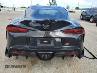 2022 Toyota GR Supra 2.0 with VIN WZ1DB2C07NW048703, listed as a Copart auction lot 48377114 with 0 mi miles and Salvage Title. Bid and sale history available at carsss.com. Image 6.