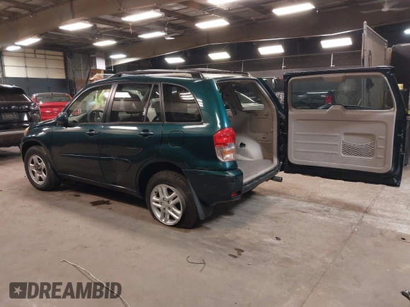 2003 Toyota RAV4 with VIN JTEGH20V130114281, listed as a IAAI auction lot 42144334 with 82,134 mi miles and . Bid and sale history available at carsss.com. Image 3.