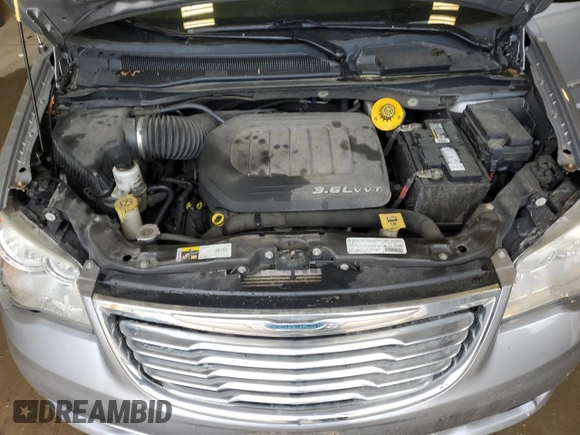 2014 Chrysler Town & Country Touring z VIN 2C4RC1BG5ER133624, wystawiony jako Copart lot #60631225 z przebiegiem 252 765 mil mil oraz Nie do naprawy • Non repairable. Historia ofert i sprzedaży dostępna na DreamBid. Obrazek 12.