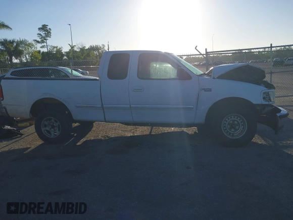 1998 Ford F-150 с VIN 1FTZX1729WKB69978, выставлен на аукционе IAAI как лот 41833491 с пробегом 145 620 миль миль и . История ставок и продаж доступна на DreamBid. Изображение 13.