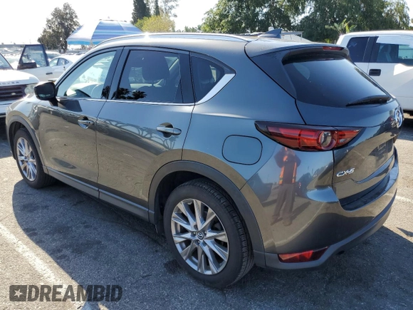 2019 Mazda CX-5 Grand Touring with VIN JM3KFADM2K0665356, listed as a Copart auction lot 51886685 with 44,760 mi miles and Salvage Title. Bid and sale history available at carsss.com. Image 2.