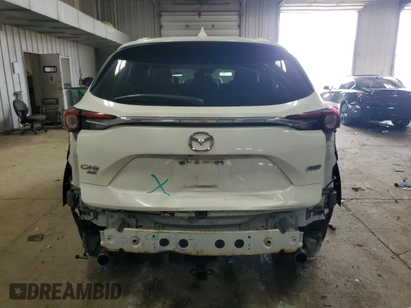 2017 Mazda CX-9 Grand Touring z VIN JM3TCBDY6H0142436, wystawiony jako Copart lot #59614265 z przebiegiem 76 833 mil mil oraz Czysty tytuł • Clean title. Historia ofert i sprzedaży dostępna na DreamBid. Obrazek 6.