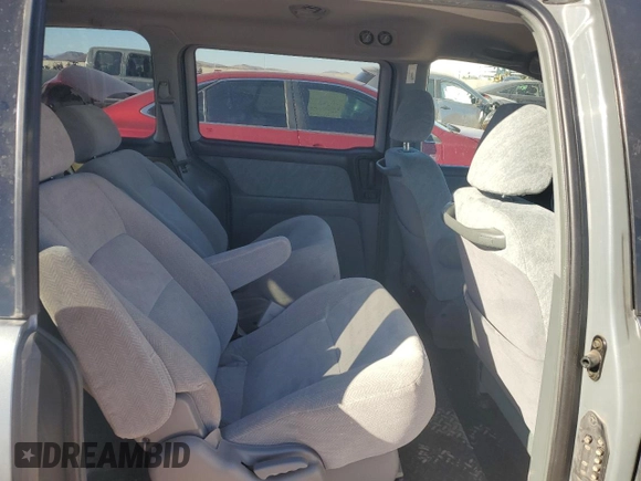 1999 Honda Odyssey EX with VIN 2HKRL1860XH541737, listed as a Copart auction lot 88897965 with 112,164 mi miles and Salvage title. Bid and sale history available at DreamBid. Image 12.