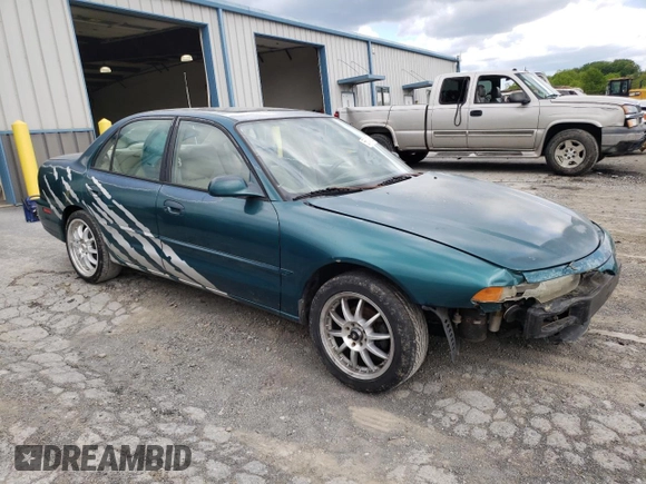 1997 Mitsubishi Galant ES z VIN 4A3AJ56G5VE019296, wystawiony jako Copart lot #56047635 z przebiegiem 87 533 mil mil oraz Szkoda całkowita • Salvage title. Historia ofert i sprzedaży dostępna na DreamBid. Obrazek 4.