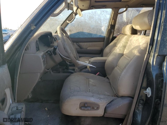 1997 Toyota Land Cruiser with VIN JT3HJ85J4V0152780, listed as a Copart auction lot 80389554 with 162,639 mi miles and Clean Title. Bid and sale history available at carsss.com. Image 7.