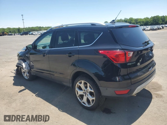 2019 Ford Escape Titanium с VIN 1FMCU9J91KUC57176, выставлен на аукционе Copart как лот 59131665 с пробегом Не указан миль и Списание • Salvage title. История ставок и продаж доступна на DreamBid. Изображение 2.