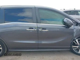 2022 Honda Odyssey Touring with VIN 5FNRL6H80NB023623, listed as a IAAI auction lot 41512586 with 63,329 mi miles and . Bid and sale history available at DreamBid. Image 14.