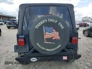 2002 Jeep Wrangler Sport with VIN 1J4FA49S72P722606, listed as a Copart auction lot 72525484 with 104,391 mi miles and Salvage Title. Bid and sale history available at carsss.com. Image 6.