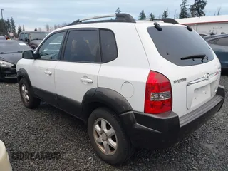 2005 Hyundai Tucson GLS with VIN KM8JN72D75U060416, listed as a IAAI auction lot 41212714 with 173,421 mi miles. Bid and sale history available at carsss.com. Image 3.