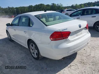 2013 Volkswagen Passat SE w/Sunroof with VIN 1VWBH7A30DC042088, listed as a IAAI auction lot 41990809 with 126,590 mi miles. Bid and sale history available at carsss.com. Image 3.