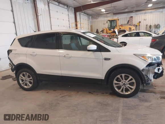 2019 Ford Escape SE z VIN 1FMCU9GDXKUA97147, wystawiony jako IAAI lot #42155997 z przebiegiem 94 829 mil mil oraz . Historia ofert i sprzedaży dostępna na DreamBid. Obrazek 13.