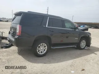 2019 GMC Yukon SLT with VIN 1GKS2BKC5KR166412, listed as a Copart auction lot 48030905 with 125,774 mi miles and Salvage Title. Bid and sale history available at DreamBid. Image 3.