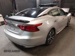 2016 Nissan Maxima SV z VIN 1N4AA6AP4GC415952, wystawiony jako IAAI lot #41806306 z przebiegiem 131 612 mil mil oraz . Historia ofert i sprzedaży dostępna na DreamBid. Obrazek 4.