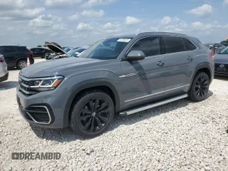 2022 Volkswagen Atlas SEL Premium R-Line with VIN 1V2FE2CA6NC219819, listed as a Copart auction lot 54796015 with 33,911 mi miles and Clean title. Bid and sale history available at DreamBid. Image 1.
