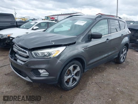 2017 Ford Escape SE with VIN 1FMCU9GD4HUE45193, listed as a IAAI auction lot 42055861 with 154,961 mi miles and . Bid and sale history available at DreamBid. Image 2.