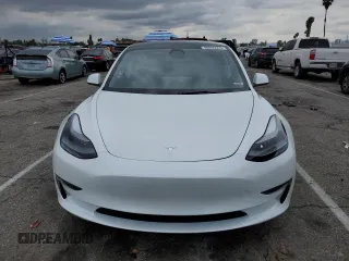 2023 Tesla Model 3 with VIN 5YJ3E1EA8PF683731, listed as a Copart auction lot 48896555 with 19,177 mi miles and Salvage title. Bid and sale history available at DreamBid. Image 5.