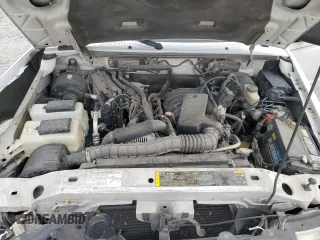 2006 Ford Ranger XL z VIN 1FTYR10U36PA59206, wystawiony jako Copart lot #52925805 z przebiegiem 162 673 mil mil oraz Szkoda całkowita • Salvage title. Historia ofert i sprzedaży dostępna na DreamBid. Obrazek 11.