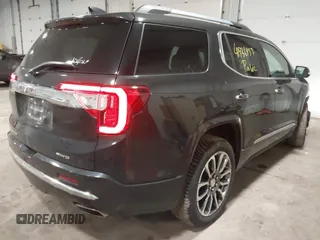 2020 GMC Acadia Denali with VIN 1GKKNXLS9LZ176047, listed as a IAAI auction lot 41936459 with 70,005 mi miles. Bid and sale history available at carsss.com. Image 4.