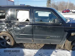 2014 Jeep Patriot Latitude with VIN 1C4NJPFAXED681859, listed as a IAAI auction lot 41271373 with 173,529 mi miles and . Bid and sale history available at DreamBid. Image 13.