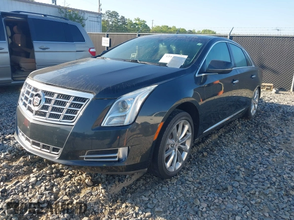 2013 Cadillac XTS Luxury with VIN 2G61P5S3XD9141306, listed as a IAAI auction lot 42034077 with 120,294 mi miles. Bid and sale history available at carsss.com. Image 17.