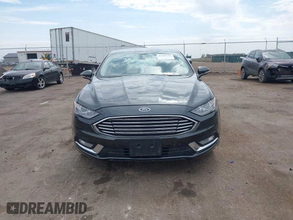 2017 Ford Fusion SE z VIN 3FA6P0H76HR354078, wystawiony jako IAAI lot #42103550 z przebiegiem 103 201 mil mil oraz . Historia ofert i sprzedaży dostępna na DreamBid. Obrazek 12.