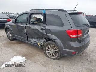 2015 Dodge Journey SXT with VIN 3C4PDCBG2FT649308, listed as a IAAI auction lot 42285409 with 140,668 mi miles and . Bid and sale history available at DreamBid. Image 3.
