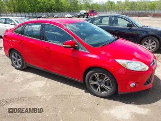 2014 Ford Focus SE with VIN 1FADP3F27EL446519, listed as a IAAI auction lot 42049152 with 115,912 mi miles. Bid and sale history available at carsss.com. Image 1.