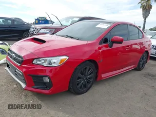 2015 Subaru WRX Premium with VIN JF1VA1D61F9832772, listed as a IAAI auction lot 41687640 with 121,102 mi miles. Bid and sale history available at carsss.com. Image 2.
