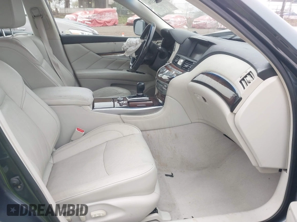 2012 Infiniti M37 with VIN JN1BY1AP8CM331234, listed as a IAAI auction lot 41524316 with 74,052 mi miles. Bid and sale history available at carsss.com. Image 5.