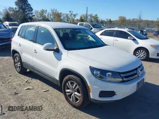 2013 Volkswagen Tiguan SEL z VIN WVGBV7AX2DW520617, wystawiony jako IAAI lot #40735913 z przebiegiem 117 392 mil mil oraz . Historia ofert i sprzedaży dostępna na DreamBid. Obrazek 1.