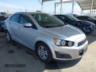 2013 Chevrolet Sonic LT with VIN 1G1JC5SB2D4243632, listed as a IAAI auction lot 42072421 with 40,289 mi miles and . Bid and sale history available at DreamBid. Image 1.